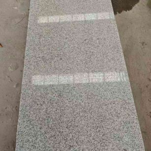 南通芝麻白光面毛板